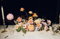 Golden hour floral centerpiece with wildflowers by Flowergirl Cville at Keswick Vineyard wedding near Charlottesville | Photo by Abby Hart Photography
