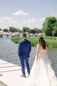 Bride and Groom First Look along water