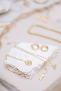 Gold jewelry on display for Echo Vintage Goods at Honolulus Art and Flea