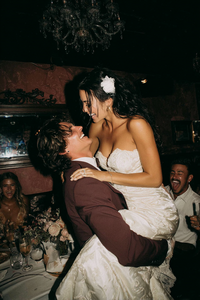 u3981682316_groom_lifting_the_bride_off_the_ground_elegant_we_54a045d9-3a65-44d1-b2ba-2021f3c39754_0