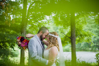 Bride and Groom in forest on wedding day