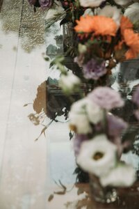 Dreamy double-exposure photo of a bridal bouquet with lavender and white flowers