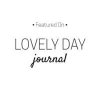 Logo of "lomzy day journal" in elegant black script on a white background, ideal for Iowa wedding planning.