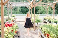 Kassidy in black dress and flower field - Senior Session