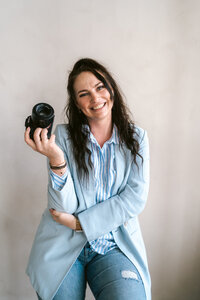 Branding fotografie van fotograaf met camera in handen - alkmaar