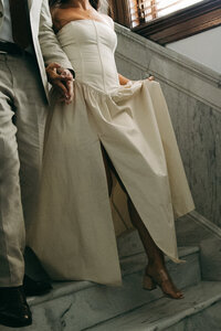 detail photo of bride walking down stairs