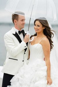 rainy newport wedding with clear umbrella