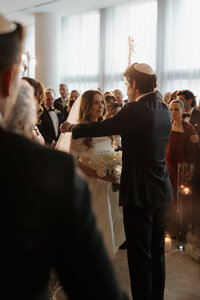Sophisticated editorial wedding photography utilizing fashion techniques during
Rebecca & Kevin's luxury destination celebration at Miami Beach Edition hotel.