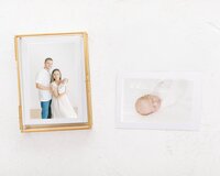 product photo of young family and newborn