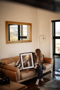 Lightkeeper Photography Photographer Katherine looking at Framed Print