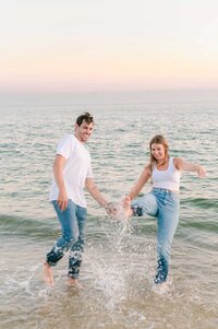 Connecticut Beach engagement with couple in jeans
