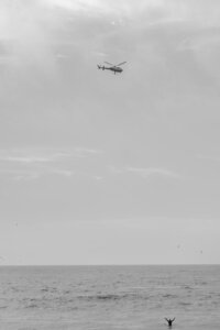 surfer helicopter motorcycle engagement photos on pacifica beach