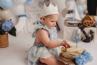 Baby celebrates her first birthday with Cake Smash Pictures at Holy City Babies Portrait Studio in Charleston, SC.