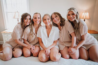 Bride and wedding party getting ready in guest rooms at Crossed Keys Inn