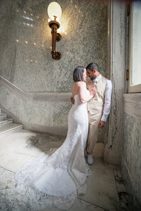 Wedding photography at SF City Hall . Portrait of a couple after the ceremony.