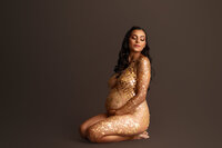 Pregnant woman poses for Editorial, Studio Maternity Photos in Charleston, SC.