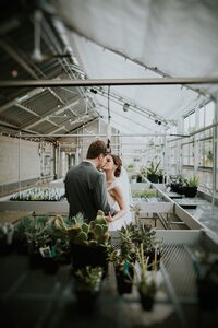 Bride and groom in Yew Dell greenhouse wedding portraits