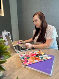 Ashlee-working-at-computer-in-office