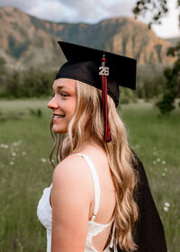 Class of 2026 Senior Girl getting her cap and gown portraits done at Beacon Rock State Park.
