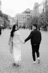 Timeless black and white 35mm film photography of a classy couple dancing - romantic session in Prague