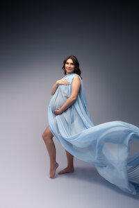 Charleston Maternity Photographer - Pregnant woman poses for Fine Art, Editorial Maternity Portraits at Holy City Babies Portrait Studio in Charleston, SC.