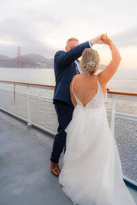 san francisco wedding cruise bride and groom dancing on deck