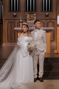 Couple posing for family photos at Immaculate Heart of Mary
Catholic Church