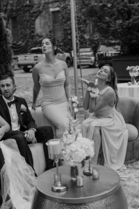 Editorial wedding party blowing kisses