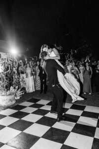 Black and white photos of groom lifting bride during their first dance.