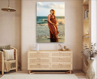 Coastal maternity portrait printed as large wall art in a warm neutral bedroom
