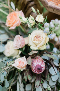 Purple and peach floral arrangement