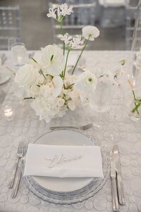 belle mer reception with white flowers