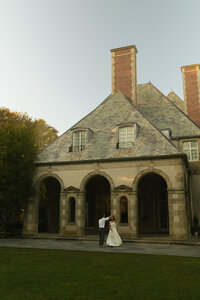 Couple dancing in front of a mansion in Newport, Rhode Island