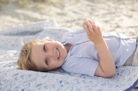 A coastal New England family session with toes in the sand and salty snuggles by the water's edge. North Shore Family Photographer. Deborah Zoe Photography.