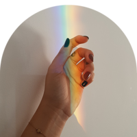 hand with rainbow light