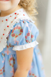 Branding photo that captures the detail of a Dondolo christmas dress