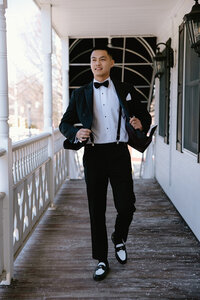 Groom getting ready at Crossed Keys Inn. Local Group Lodging in Andover NJ.