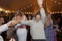 Guests enjoy dancing during tented wedding reception on Nantucket.