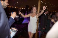 Guests enjoy dancing during tented wedding reception on Nantucket.