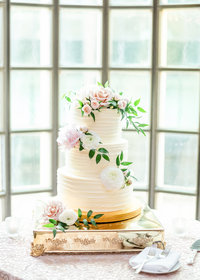 Simple, white and pink wedding cake
