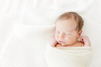 newborn-snuggled-blanket-cream