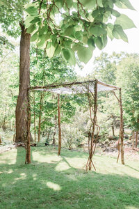 Outdoor wooden ceremony arch