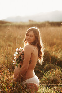 Maternity photoshoot in Christchurch with flowers