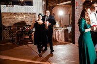 Mahlia and Pat on the dance floor testing the lighting for the reception photos