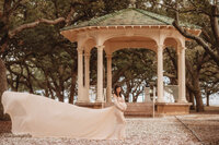 Maternity Photos in Charleston, SC -- Expectant mother poses for Maternity Portraits at White Point Garden in downtown Charleston, SC.