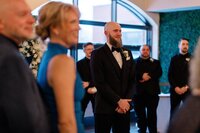 Groom reaction seeing bride for the first time Bell in Scona Edmonton wedding