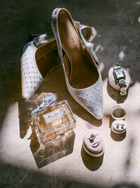 Step into timeless elegance with Miss Dior Perfume, Dior Couture heels, Cartier and Tiffany's Baubles & Bangles captured through the lens of Michael Asmussen. For the discerning bride seeking fine art destination wedding photography with an editorial touch in 2026.