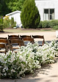michigan-floral-ceremony-aisle-wooden-chairs