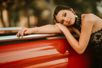 nior portrait at Triple T Farms in Fruitdale, Alabama — vintage red truck