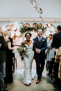 Wedding recessional at one of the best downtown Louisville Kentucky wedding venues, 21C